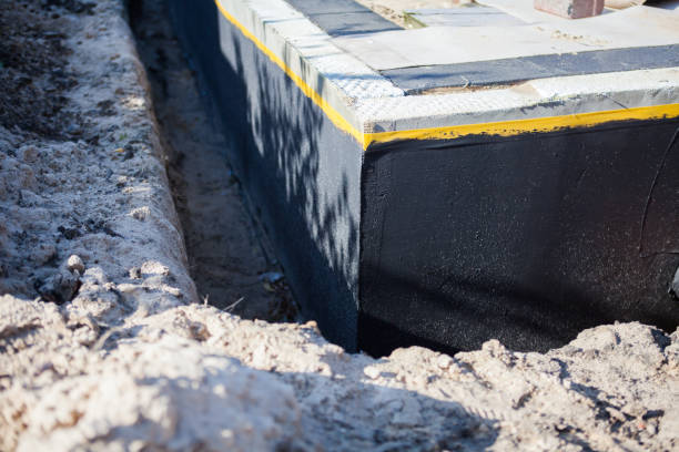 Professional Waterproofing technician working in Berkey, OH